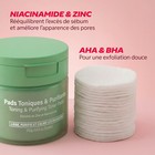 Pad tonique imbibé de sérum exfoliant AHA niacinamide