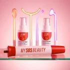 My SOS Beauty high frequency device, tips and mists on a glass shelf